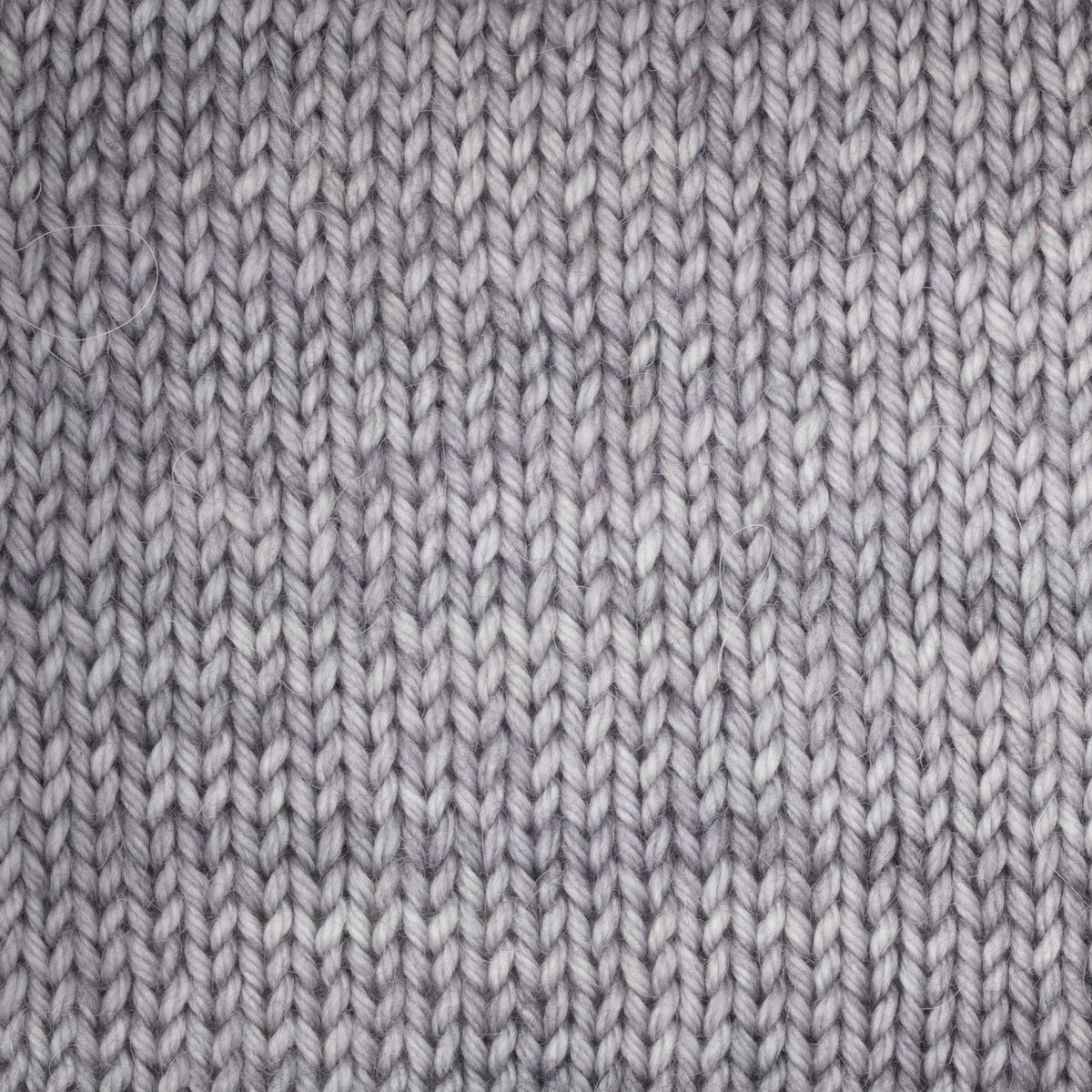 100g skein of Symfonie Serra yarn in First Frost