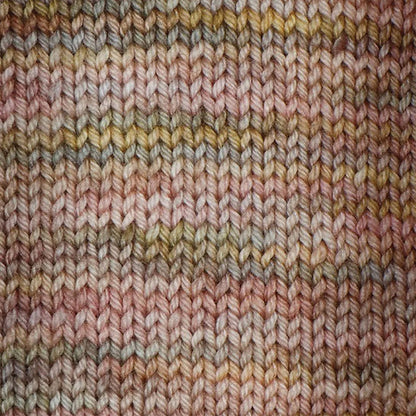 Skein of Symfonie Terra sock yarn in Moonlit Glow