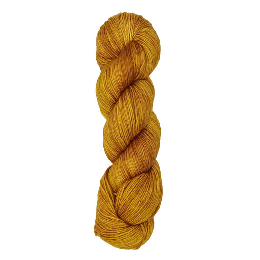 Skein of Symfonie Yarns Terra sock yarn in Gold Leaf