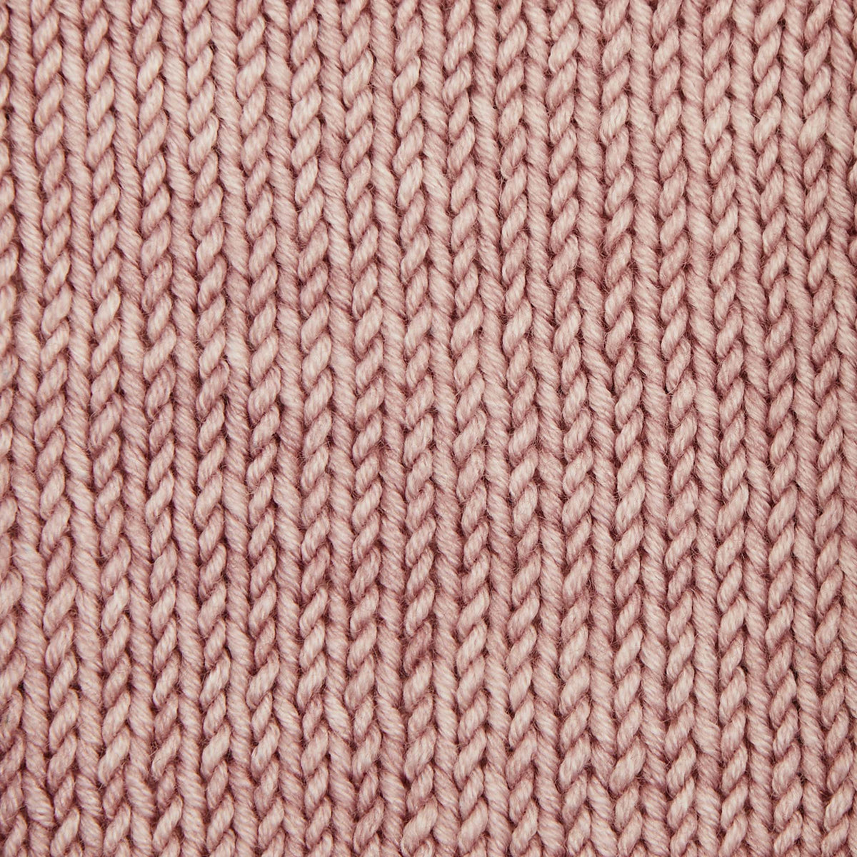Skein of Symfonie Viva DK merino yarn in Pink Sandstone