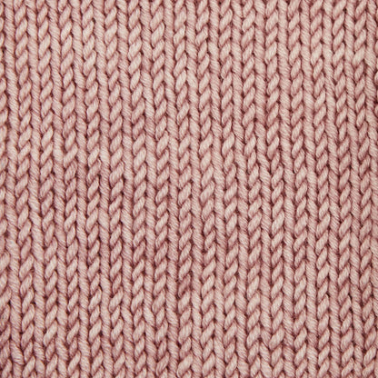 Skein of Symfonie Viva DK merino yarn in Pink Sandstone