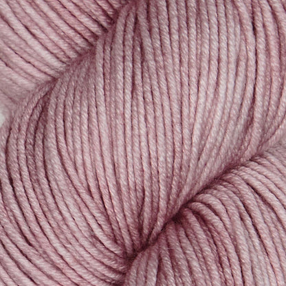 Skein of Symfonie Viva DK merino yarn in Pink Sandstone
