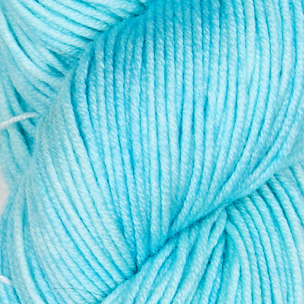 Skein of Symfonie Viva DK merino yarn in Aqua Ice