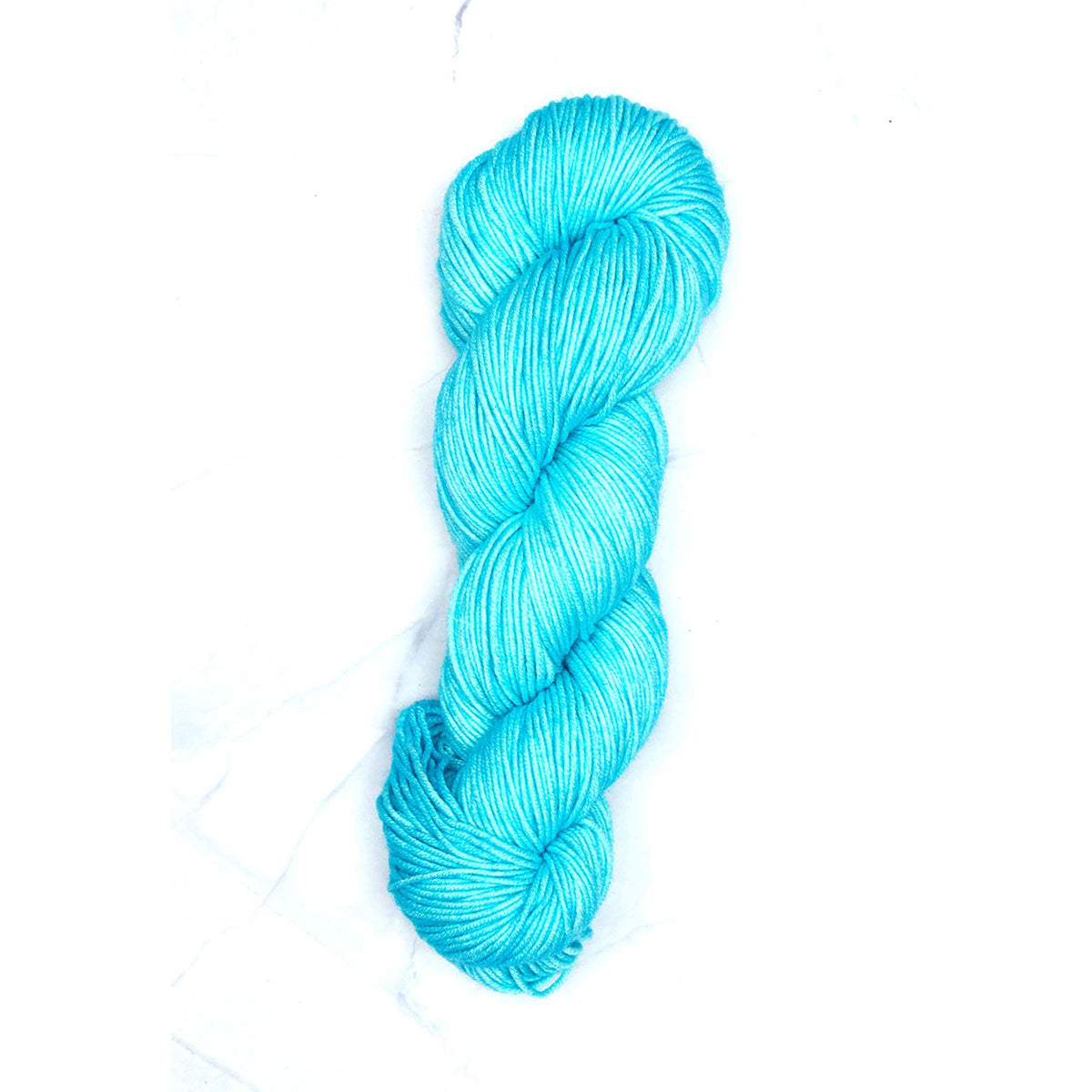 Skein of Symfonie Viva DK merino yarn in Aqua Ice