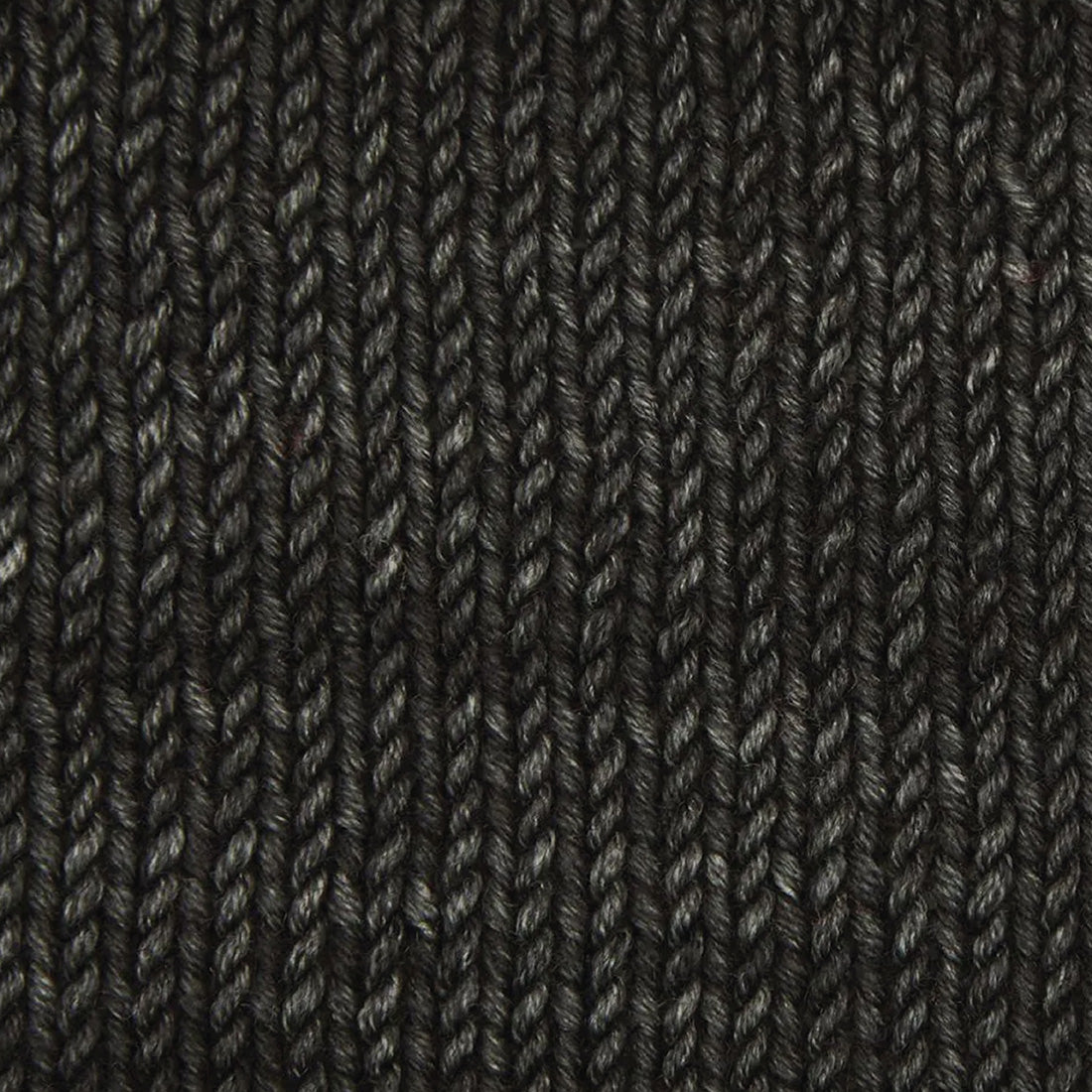 Skein of Symfonie Viva DK merino yarn in Black Pepper
