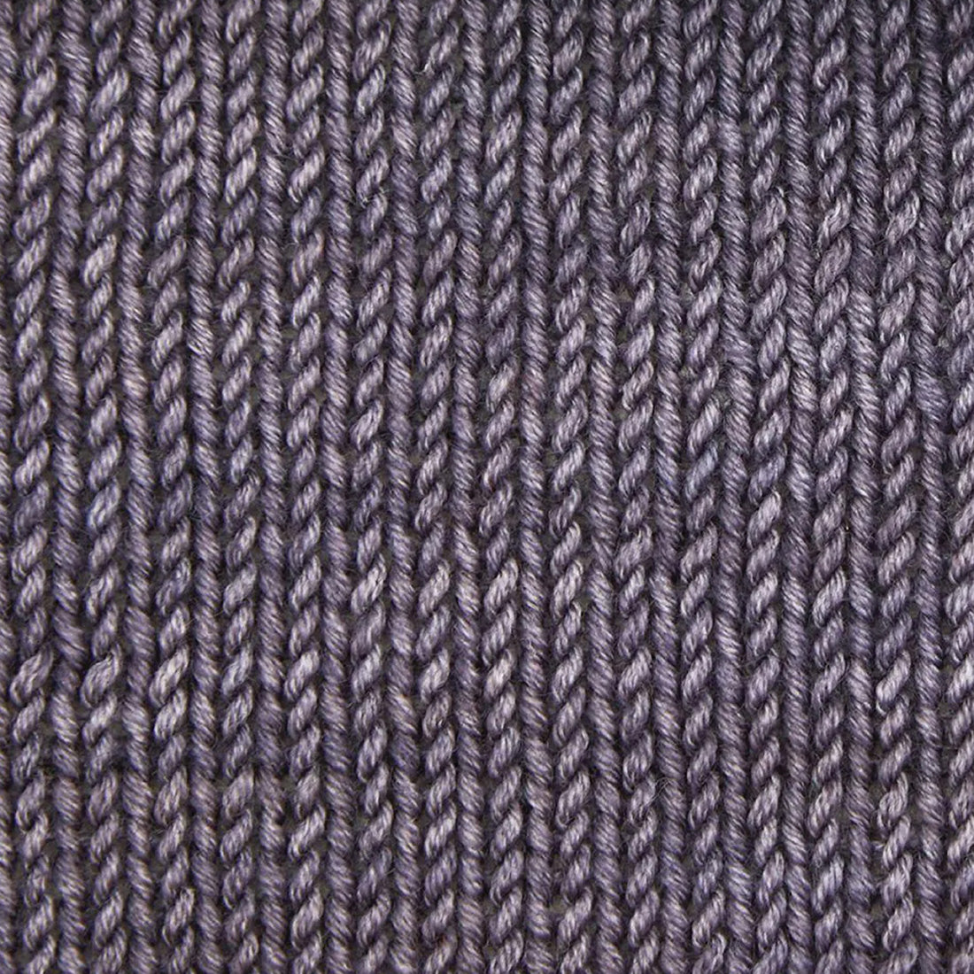 Skein of Symfonie Viva DK merino yarn in Plum Denim