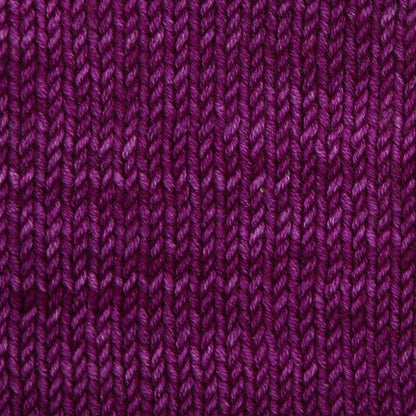 Skein of Symfonie Viva DK merino yarn in Purple Fuchsia