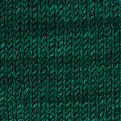 Skein of Symfonie Viva DK merino yarn in Deep Emerald