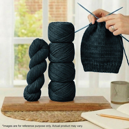 Skein of Symfonie Viva DK merino yarn in Midnight Forest