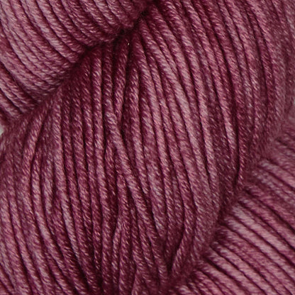 Skein of Symfonie Viva DK merino yarn in Bougainvillea