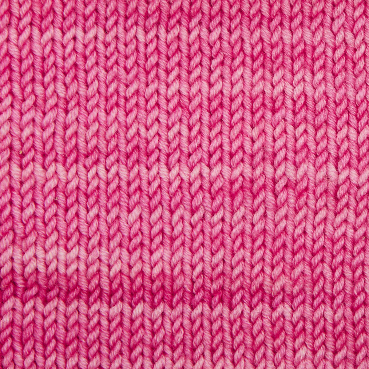 Skein of Symfonie Viva DK merino yarn in Camellia