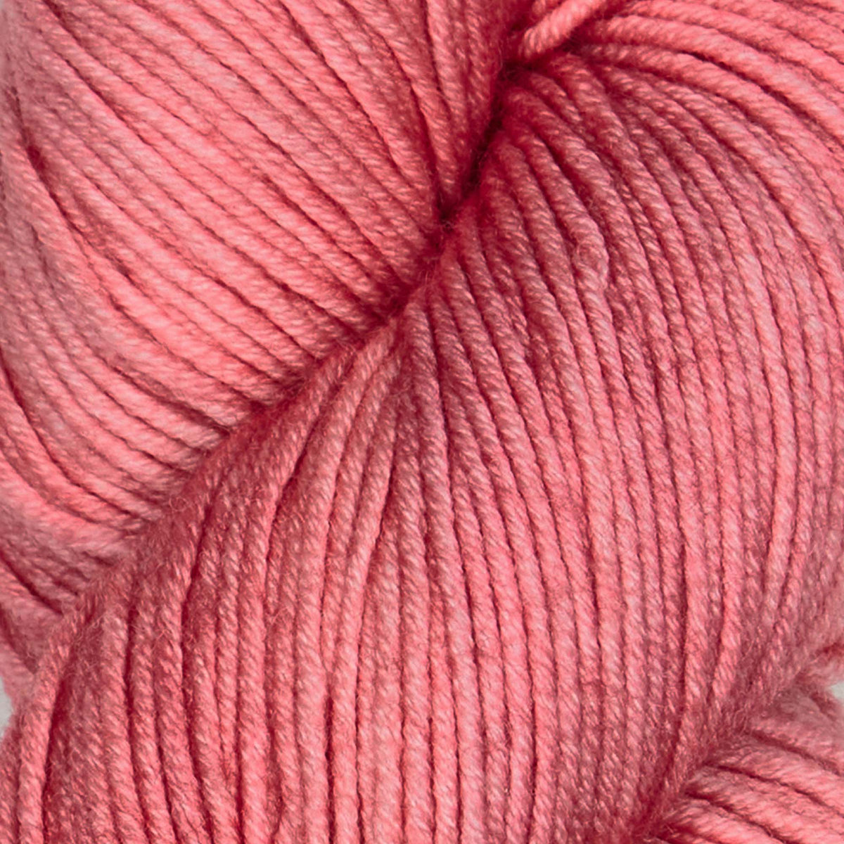 Skein of Symfonie Viva DK merino yarn in Jaipur Pink