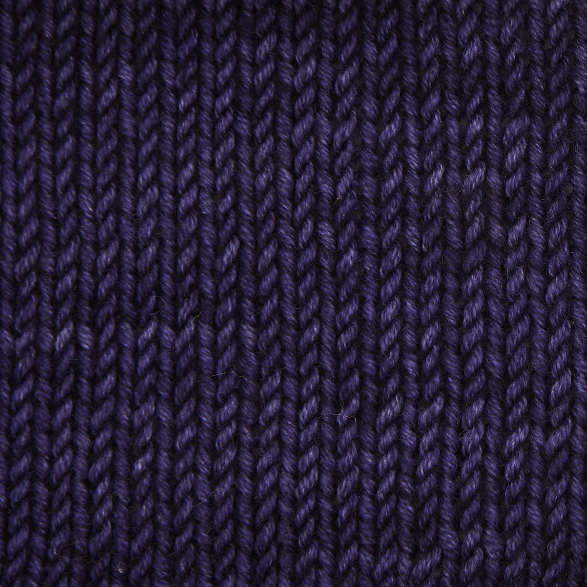 Skein of Symfonie Viva DK merino yarn in Java Plum