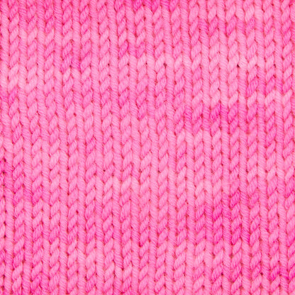 Skein of Symfonie Viva DK merino yarn in Ka-Pow Pink
