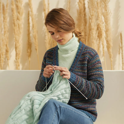 Skein of Symfonie Viva DK merino yarn in Tropical Seascape