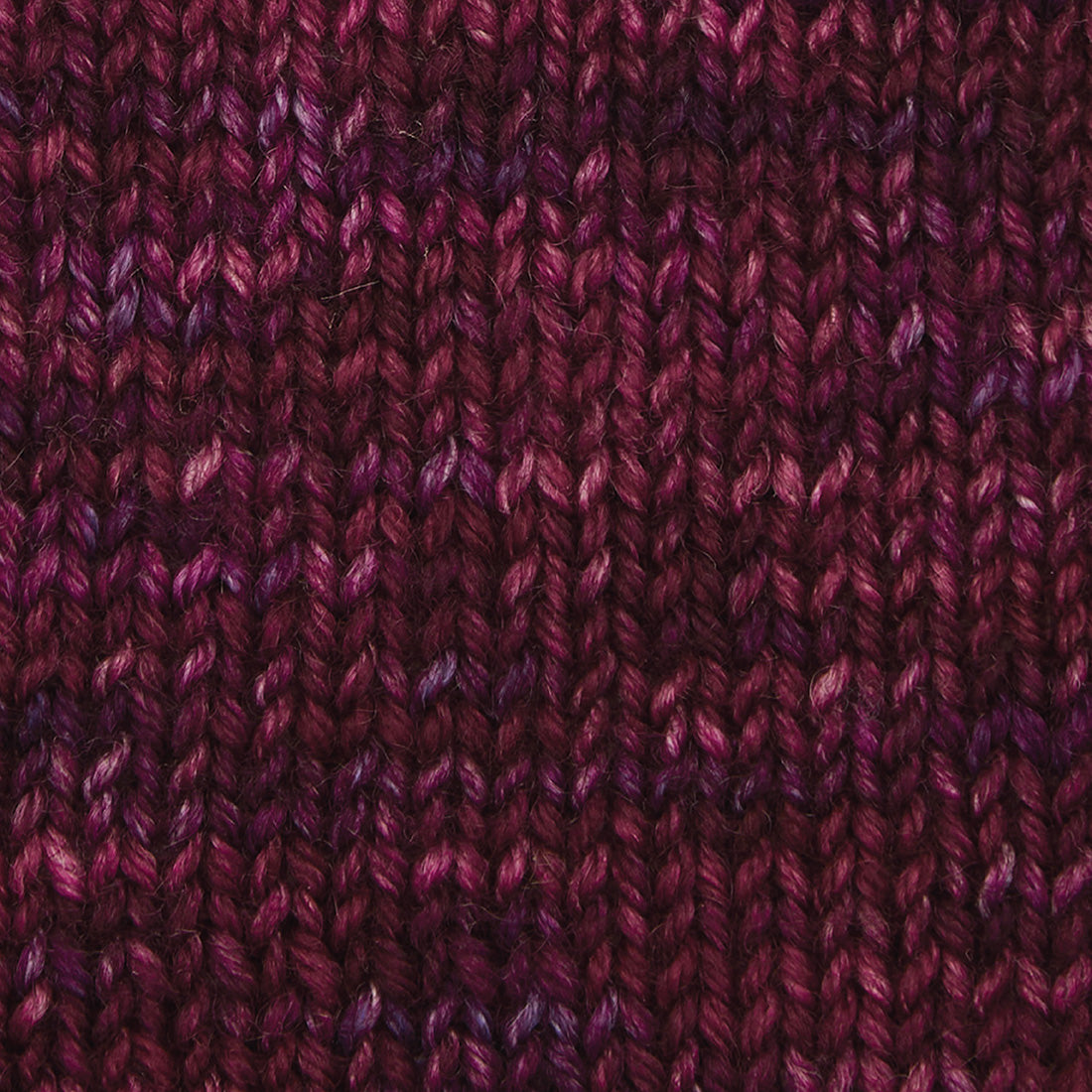 Skein of Symfonie Viva merino DK yarn in Valentine shade