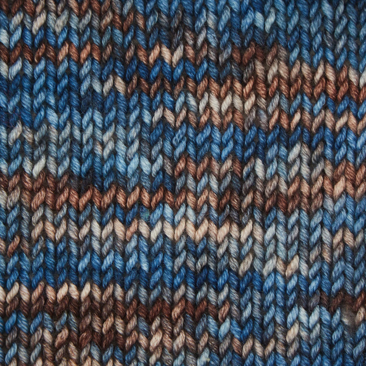 Skein of Symfonie Viva DK merino yarn in Cabin In The Woods