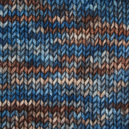 Skein of Symfonie Viva DK merino yarn in Cabin In The Woods