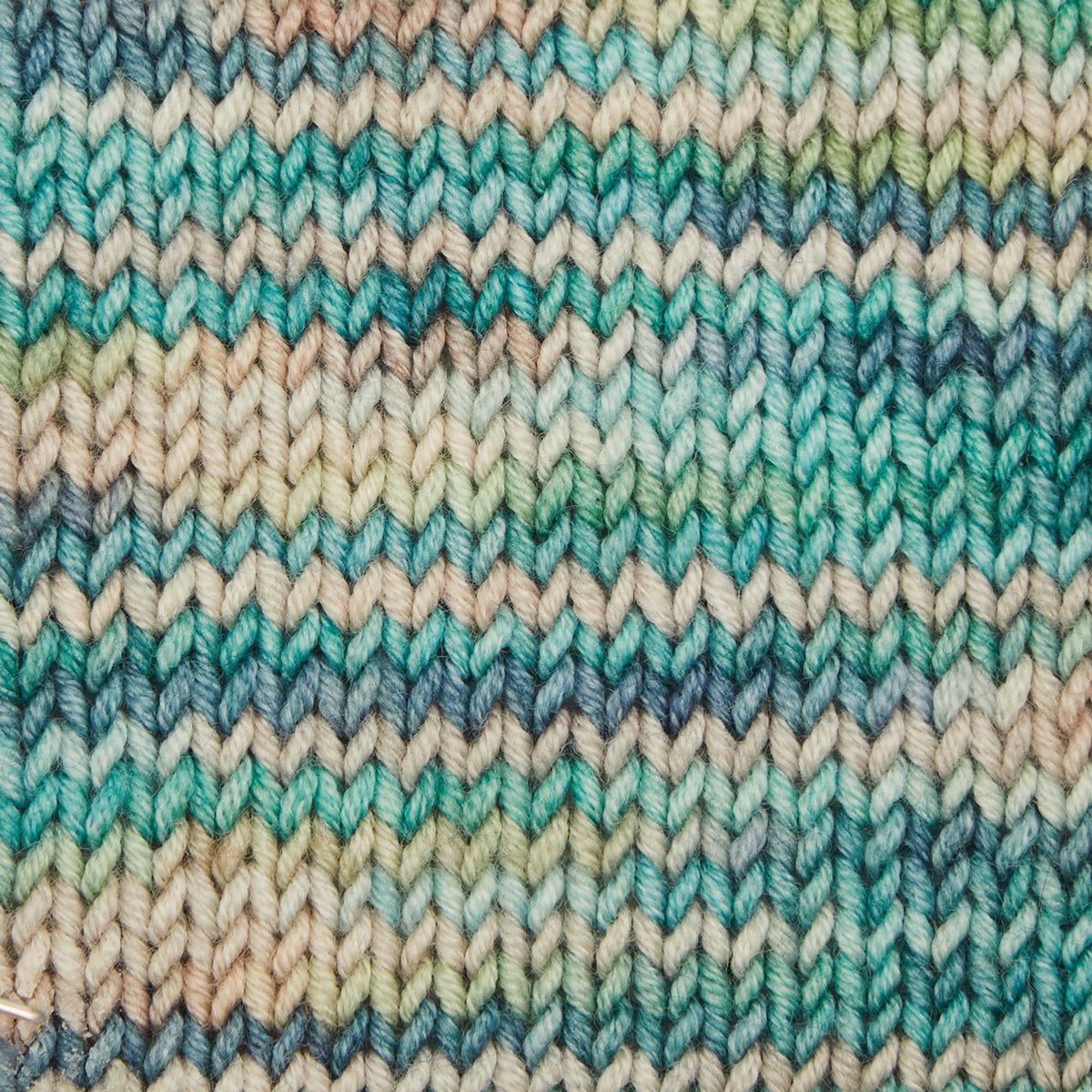 Skein of Symfonie Viva DK merino yarn in Sandy Sea