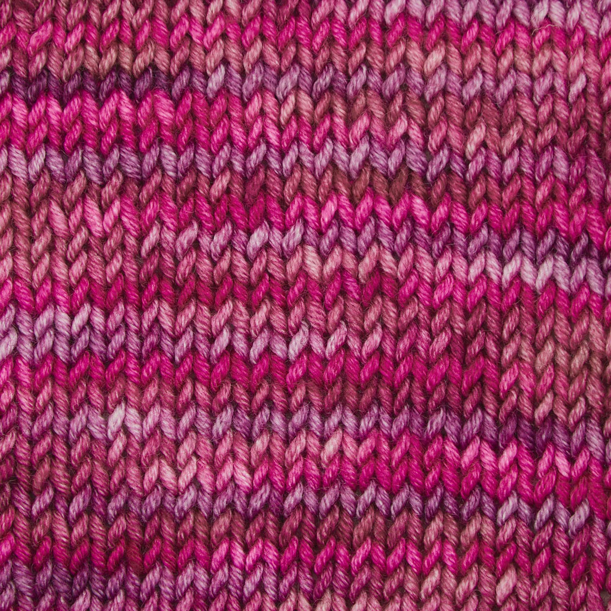 Skein of Symfonie Viva DK merino yarn in Autumn Rose