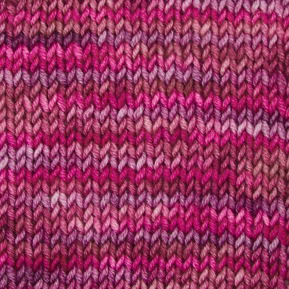 Skein of Symfonie Viva DK merino yarn in Autumn Rose