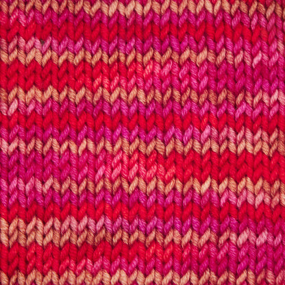 Skein of Symfonie Viva DK merino yarn in Rhubarb