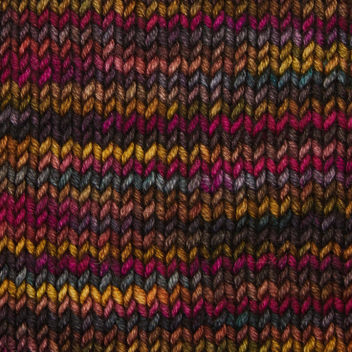 Skein of Symfonie Viva DK merino yarn in Harvest Vine