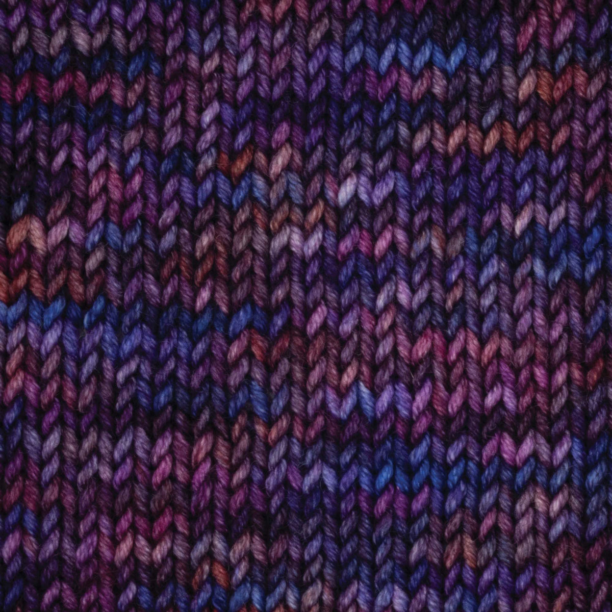 Skein of Symfonie Viva DK merino yarn in Midnight Orchid
