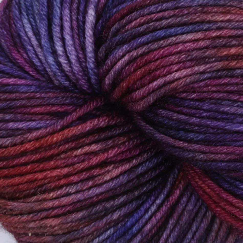 Skein of Symfonie Viva DK merino yarn in Midnight Orchid