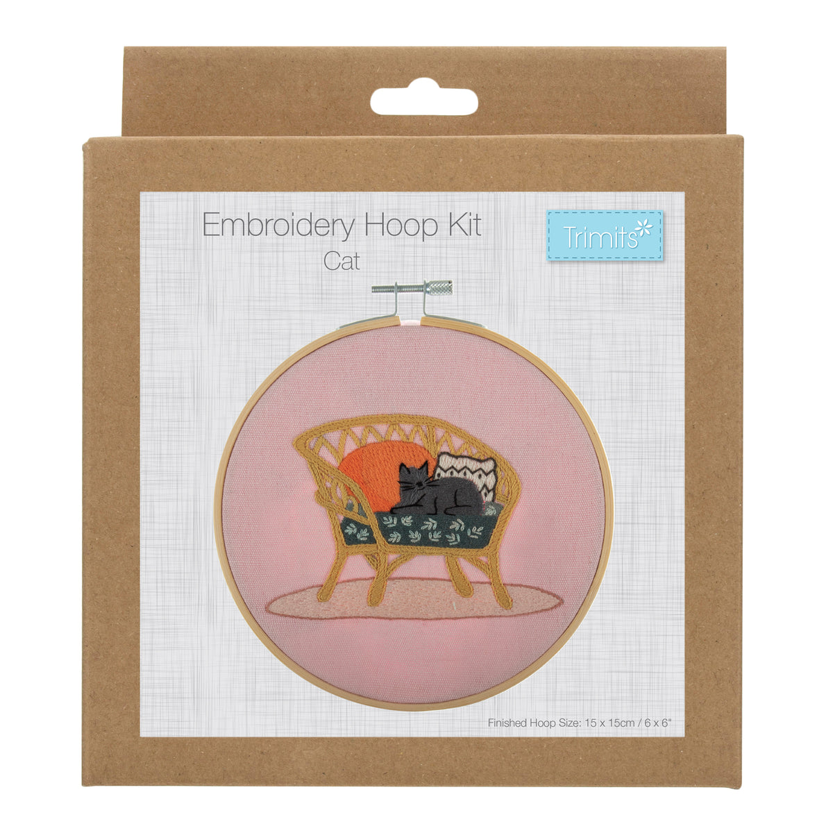 Embroidery hoop kit showing a stitched cat on wicker chair design