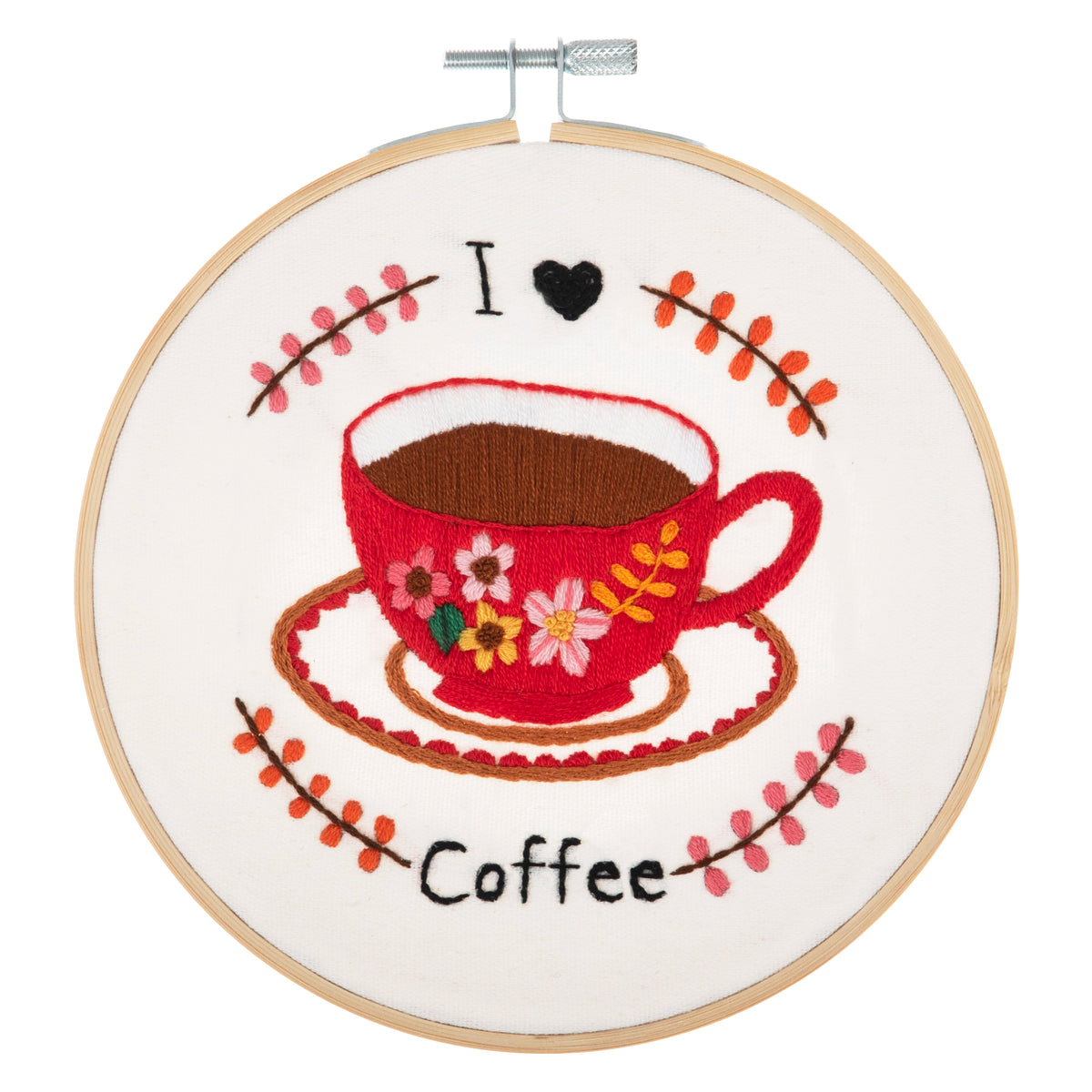 Embroidery hoop kit showing a stitched i love coffee design