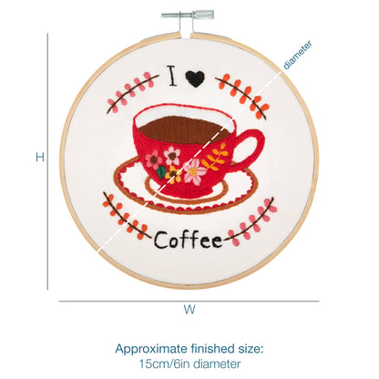 Embroidery hoop kit showing a stitched i love coffee design