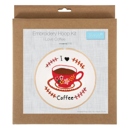 Embroidery hoop kit showing a stitched i love coffee design