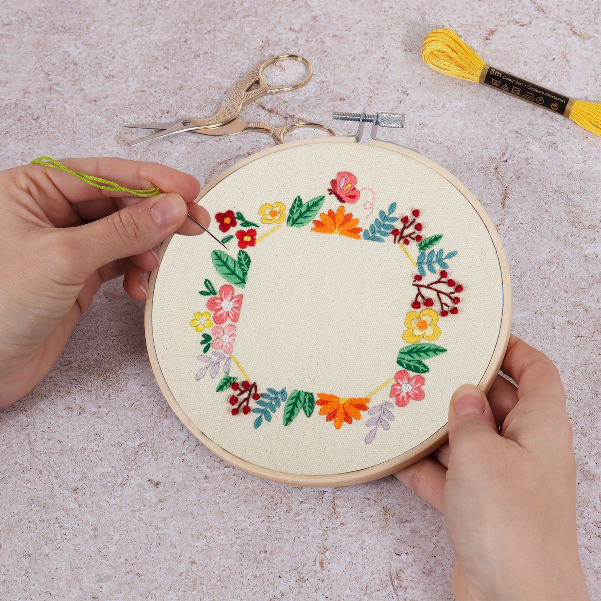 Finished floral photo frame embroidery in a 15cm bamboo hoop