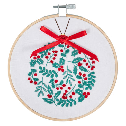 Finished holly berry bauble embroidery in a 15cm bamboo hoop