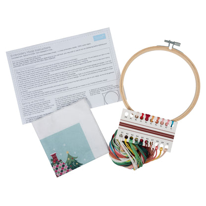 Finished christmas cottage embroidery in a 15cm bamboo hoop