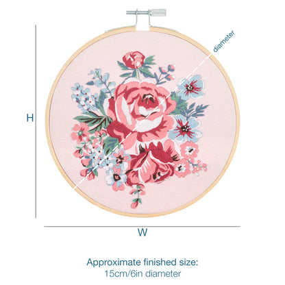 Finished rose blossom embroidery in a 15cm bamboo hoop