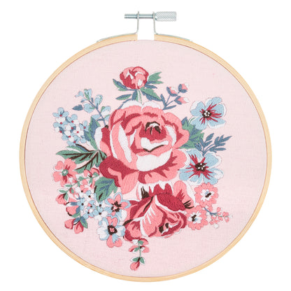 Finished rose blossom embroidery in a 15cm bamboo hoop