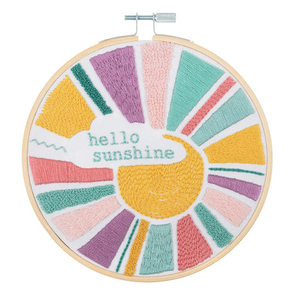 Finished rainbow embroidery in a 15cm bamboo hoop