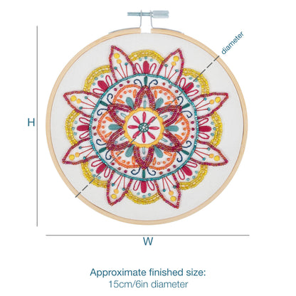 Finished mandala embroidery in a 15cm bamboo hoop