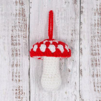 Crocheted red and white toadstool
