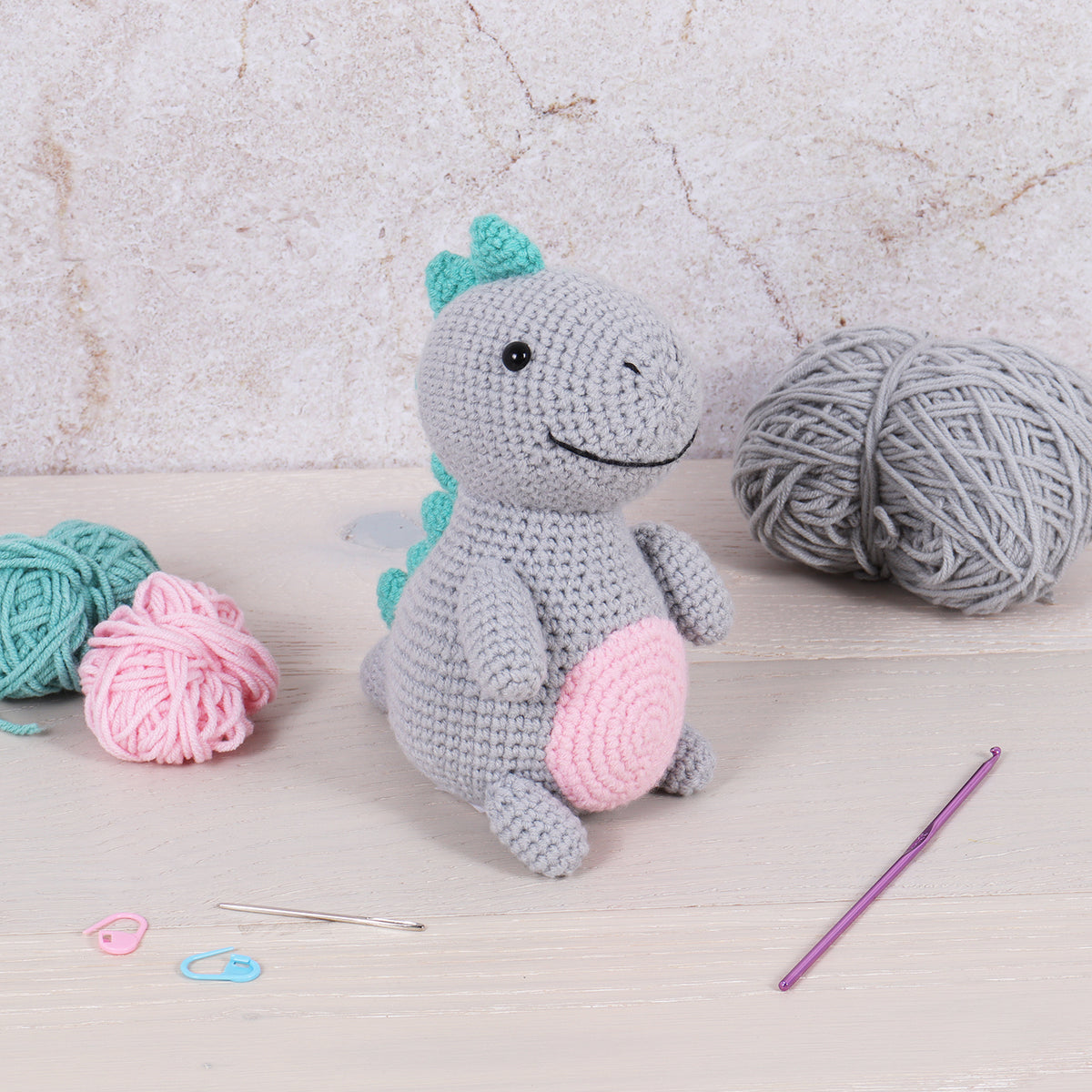 Crocheted amigurumi dinosaur
