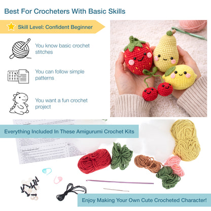 Four crocheted amigurumi fruits with smiley faces
