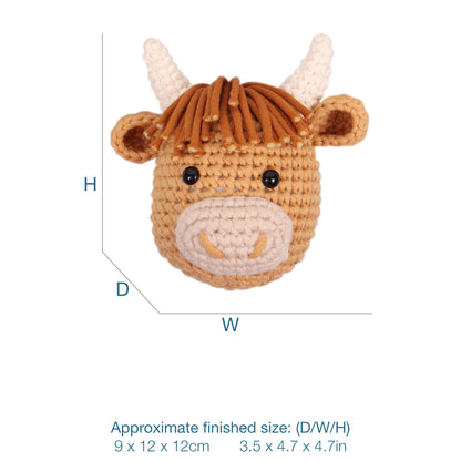 Crocheted amigurumi highland cow