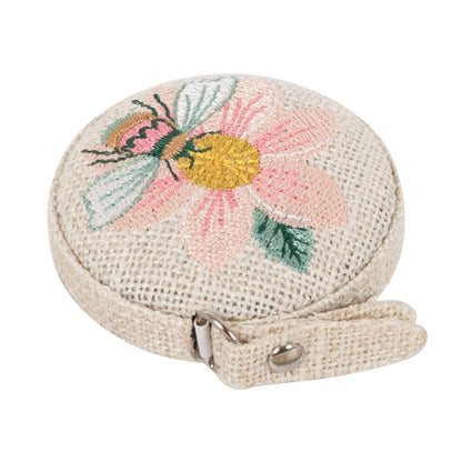 Retractable tape measure with embroidered patchwork bee