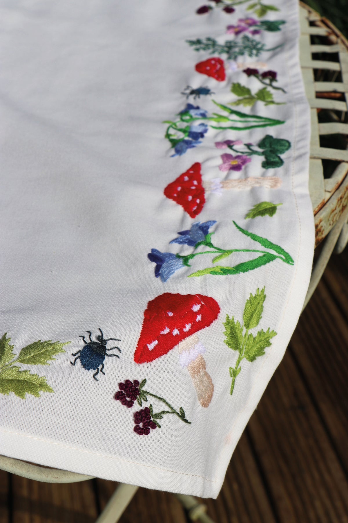 Embroidered cotton tablecloth with toadstool design
