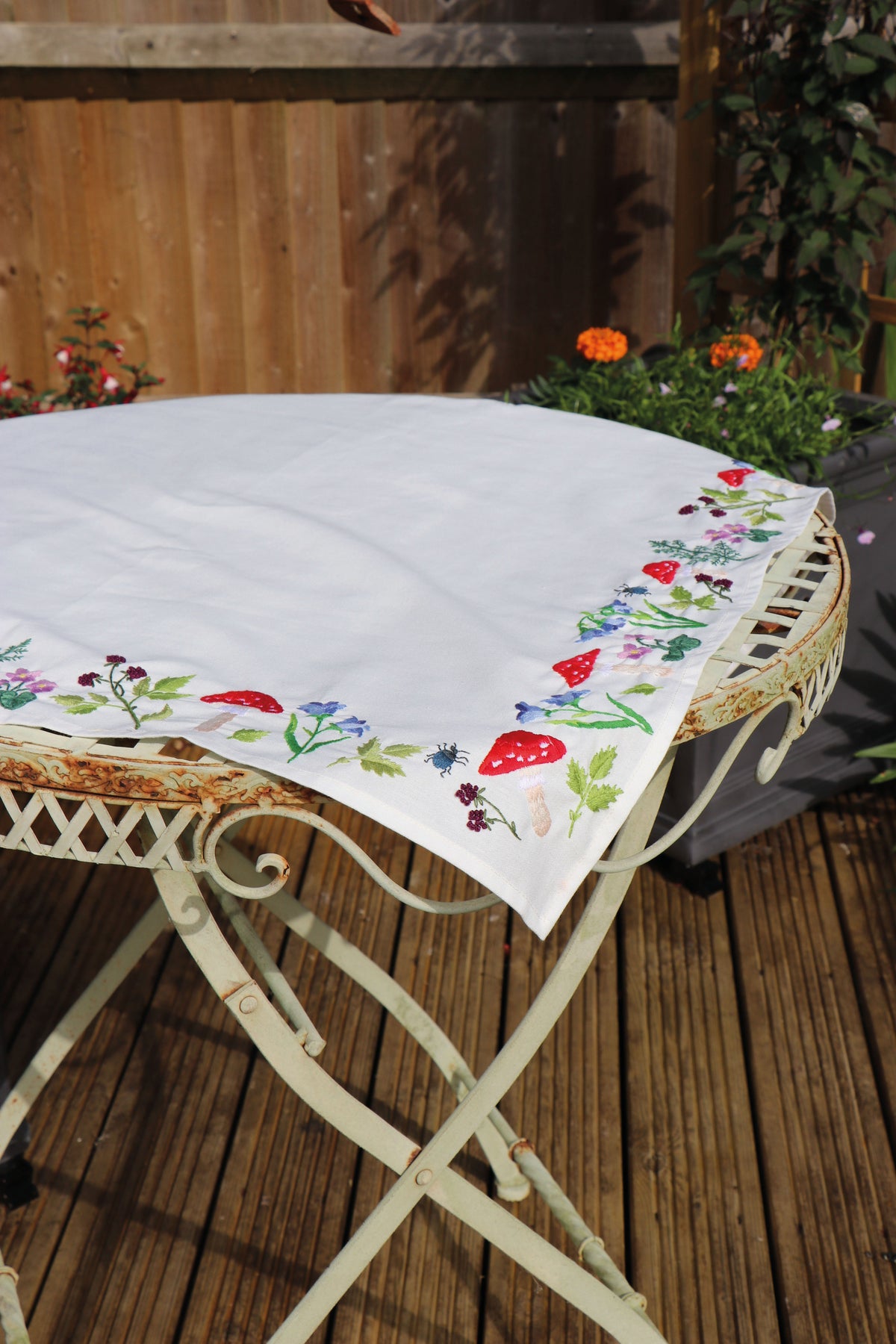 Embroidered cotton tablecloth with toadstool design