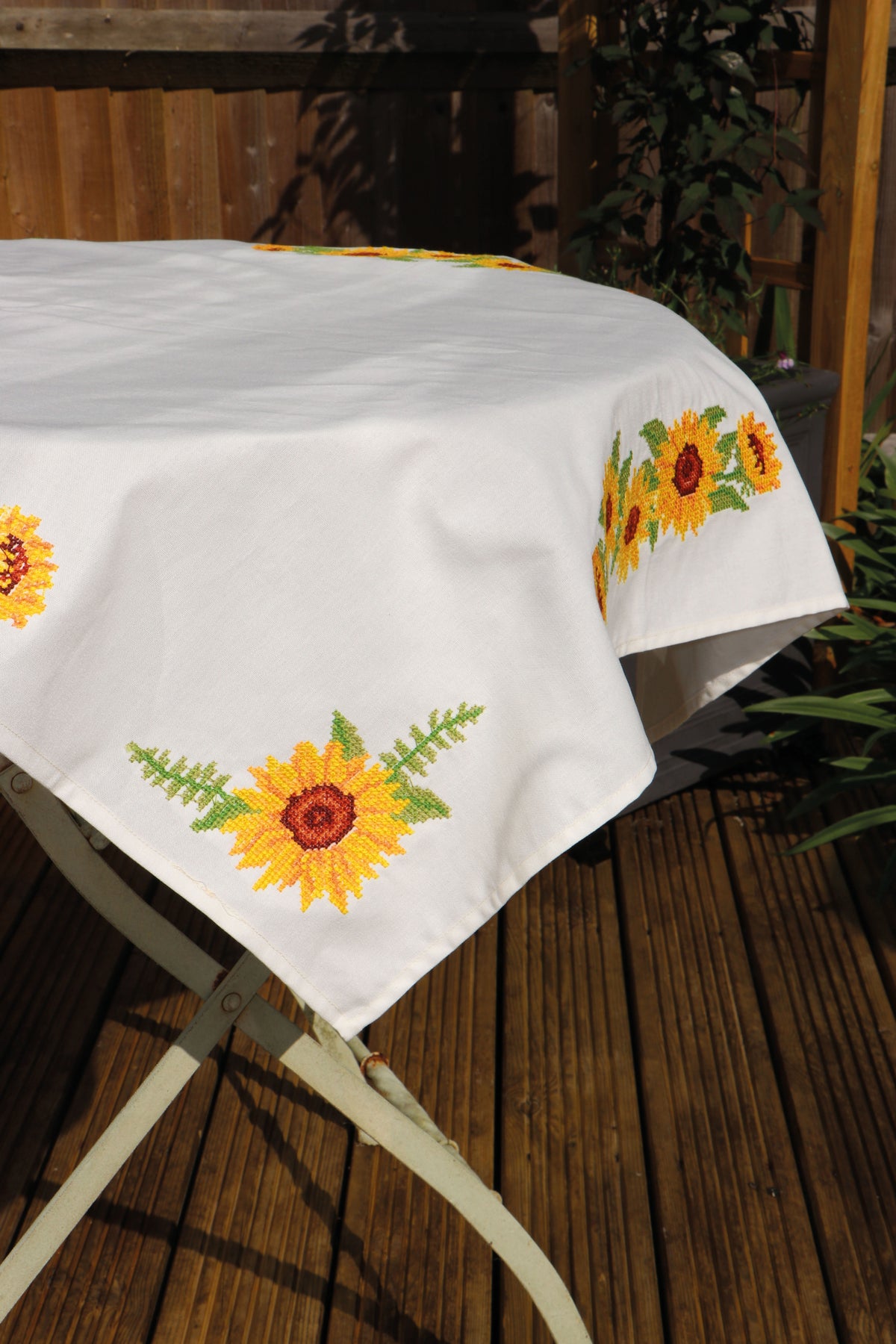 Cross stitched cotton tablecloth with sunflower design