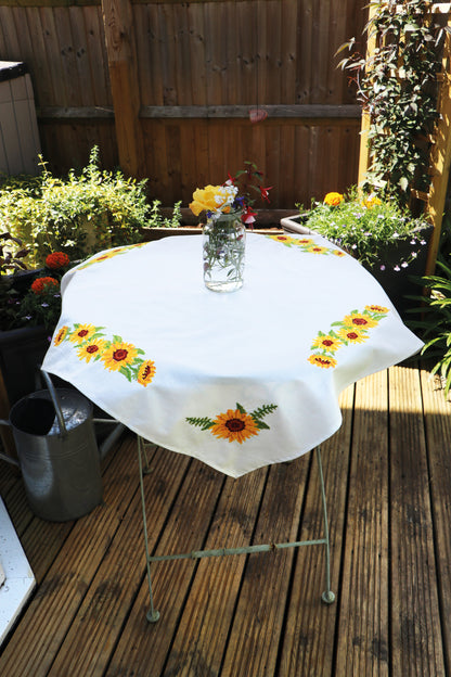 Cross stitched cotton tablecloth with sunflower design