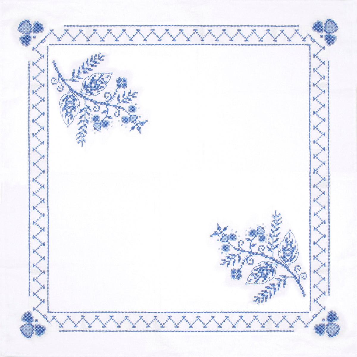 Cross stitched cotton tablecloth with blue floral design